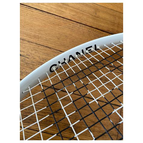 raquette de tennis chanel